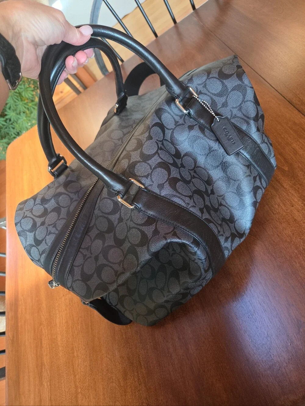 Coach Black Signature Leather Weekender tote bag dark gray and black.